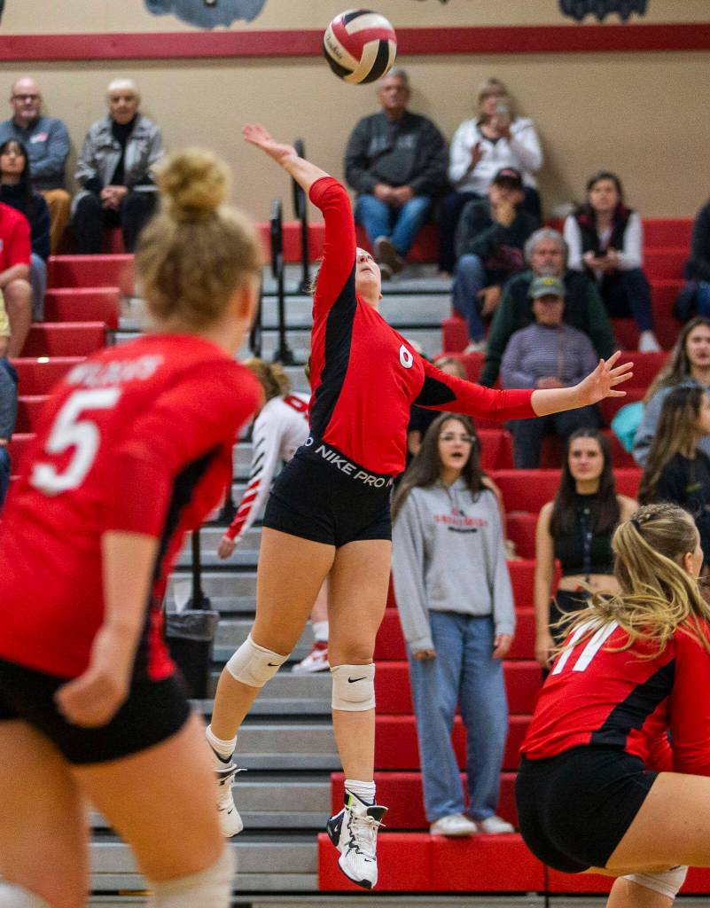 Archbishop Murphys Tatum Gill spikes the ball during the match against Snohomish on Wednesday, Oct. 19, 2022 in Snohomish, Washington. (Olivia Vanni / The Herald)