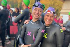 Misty Johnson (left) and her guide Amy Lewandowski, compete in the Ironman 70.3 Washington half-ironman triathlon last month in Maple Valley. (Photo provided by Amy Lewandowski)