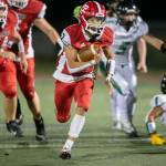 Marysville Pilchucks Joseph Davis runs the ball during a game against Marysville Getchell on Sept. 16 in Marysville. Davis is fourth in the area with 817 yards rushing. (Olivia Vanni / The Herald)