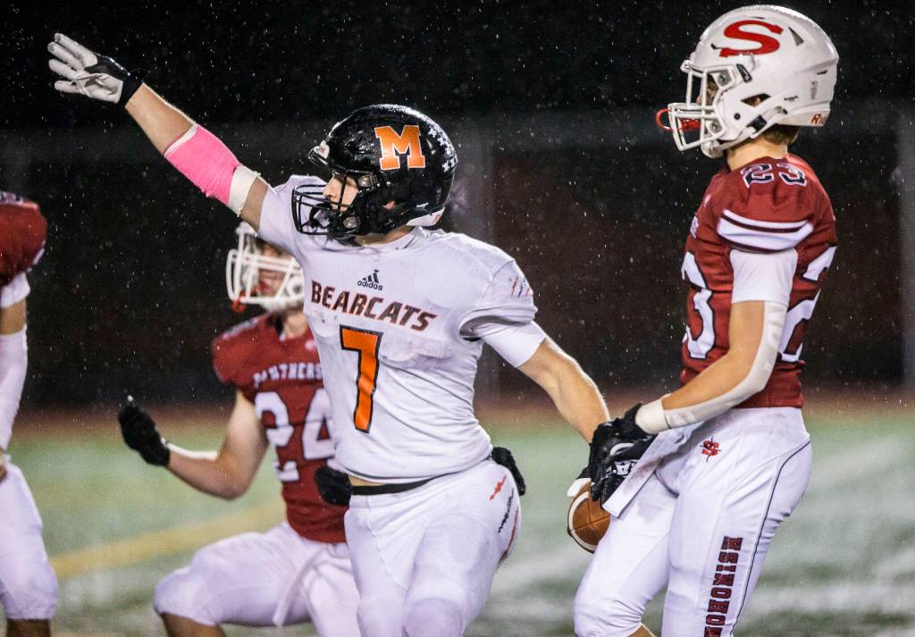 Monroe receiver Kody Edelbrock celebrates a first down. (Olivia Vanni / The Herald)