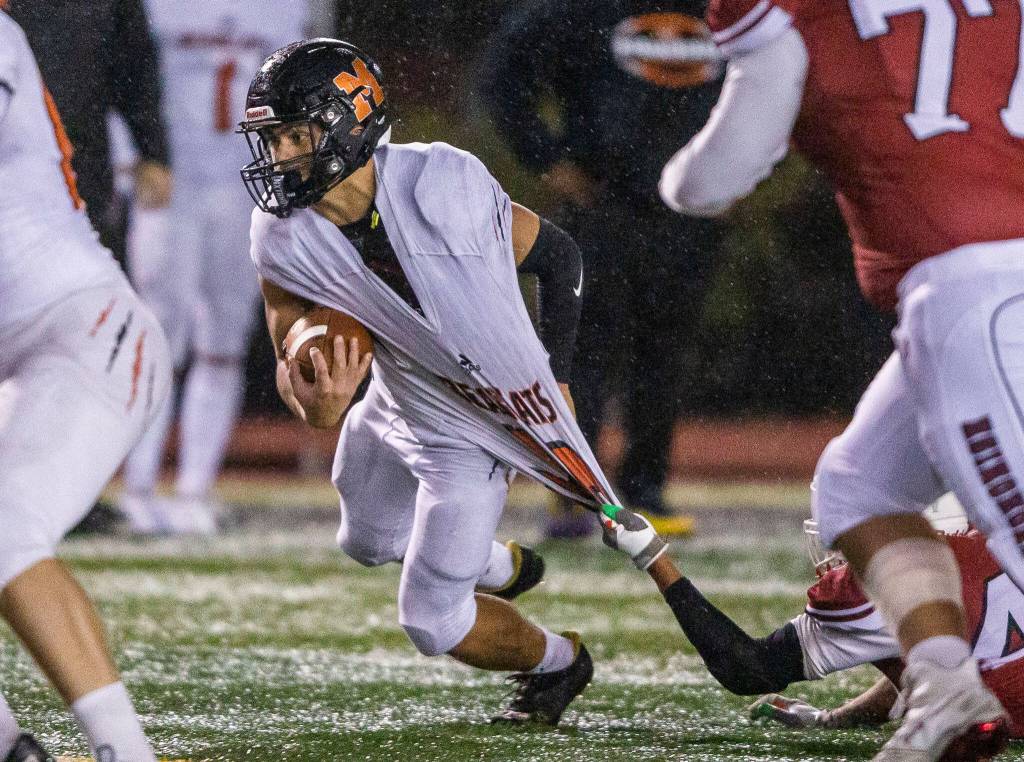 Monroes Beau Pruett has his jersey pulled during a game against Snohomish on Friday, Oct. 21, 2022 in Snohomish, Washington. (Olivia Vanni / The Herald)