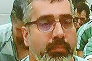 Robert Charles Lindsay, 45, a former police officer, appeared in Everett District Court after his arrest for investigation of repeatedly drugging a Monroe woman and, at one point, trying to rape her. (Caleb Hutton / The Herald)