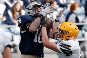 Glacier Peak’s Ryan King comes down with a tough touchdown reception against Ferndale on Saturday, Sep. 17, 2022, at Lumen Field in Seattle, Washington. (Ryan Berry / The Herald)