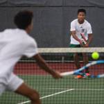 Edmonds-Woodway Russell Anderson, right, waits for the next volley from bother Steven Anderson during the 3A district singles championship match on Thursday, Oct. 27, 2022 in Snohomish, Washington. (Olivia Vanni / The Herald)