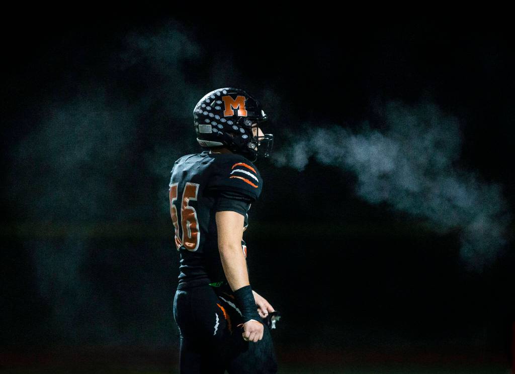 Steam radiates off of Monroes David Portnow during the game against Ferndale on Friday, Oct. 28, 2022 in Monroe, Washington. (Olivia Vanni / The Herald)