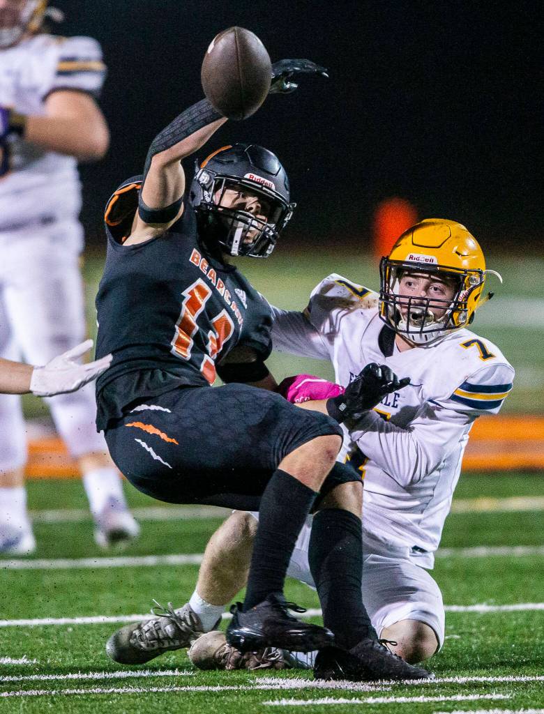 Monroes Eli Miller fumbles a pass during the game against Ferndale on Friday, Oct. 28, 2022 in Monroe, Washington. (Olivia Vanni / The Herald)