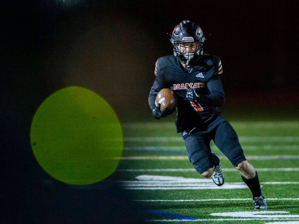 Monroes Mason Davis runs the ball during the game against Ferndale on Friday, Oct. 28, 2022 in Monroe, Washington. (Olivia Vanni / The Herald)
