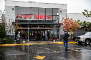 Customers walk in and out of Fred Meyer along Evergreen Way on Monday, Oct. 31, 2022 in Everett, Washington. (Olivia Vanni / The Herald)
