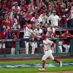 The Phillies Kyle Schwarber rounds the bases after hitting a two-run home run during the fifth inning of Game 3 of the World Series against the Astros on Tuesday in Philadelphia. (AP Photo/Matt Rourke)