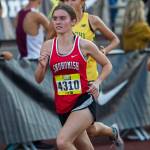 Snohomish’s Paige Gerrard runs their first lap in the girls elite race at the Hole In The Wall Invitational on Saturday, Oct. 8, 2022 in Arlington, Washington. (Olivia Vanni / The Herald)