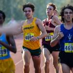 Shorecrest’s Luke Schmidt crosses the finish line in the boys elite race at the Hole In The Wall Invitational on Saturday, Oct. 8, 2022 in Arlington, Washington. (Olivia Vanni / The Herald)
