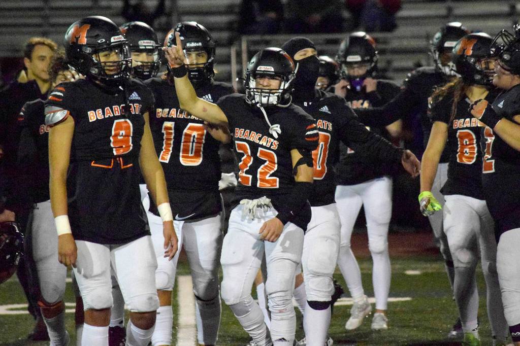 Monroe junior Jack Irwin celebrates his teams victory over Liberty on Friday, Nov. 4, 2022 in Monroe, Washington. (Katie Webber / The Herald)