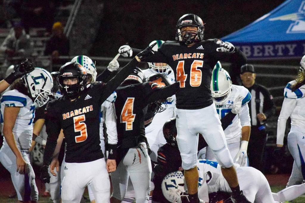 Monroe sophomore Aiden Boldt celebrates after Monroe recovers a Liberty fumble on Friday, Nov. 4, 2022 at Monroe High School in Monroe, Washington. (Katie Webber / The Herald)