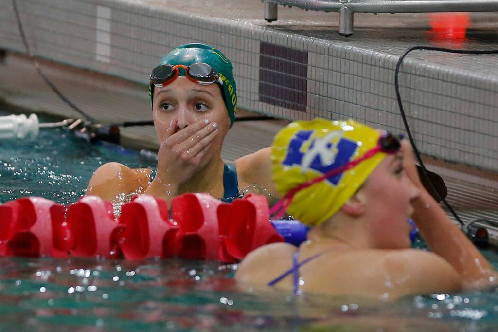 Shorecrest sophomore Quinn Whorley looks up in disbelief after winning the 500 yard freestyle during the Class 4A District swim meet Saturday, Nov. 5, 2022, at Snohomish Aquatic Center in Snohomish, Washington. (Ryan Berry / The Herald)