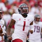 Washington State quarterback Cameron Ward (1) celebrates after throwing a touchdown against Stanford during the first half of an NCAA college football game in Stanford, Calif., Saturday, Nov. 5, 2022. (AP Photo/Godofredo A. Vásquez)