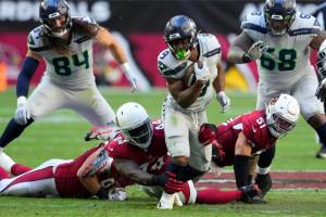Seattle Seahawks running back Kenneth Walker III (9) runs against the Arizona Cardinals during an NFL football game in Glendale, Ariz., Sunday, Nov. 6, 2022. (AP Photo/Matt York)