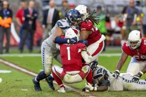Seattle Seahawks linebacker Uchenna Nwosu (10) sacks Arizona Cardinals quarterback Kyler Murray (1) in an NFL football game, Sunday, Nov. 6, 2022, in Glendale, Ariz. Seahawks won 31-21. (AP Photo/Jeff Lewis)