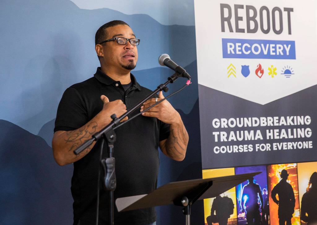 Gunnar Rauch, a participant in Reboot Recovery, briefly speaks about his experience during an open house for the facility on Monday, in Marysville. (Olivia Vanni / The Herald)
