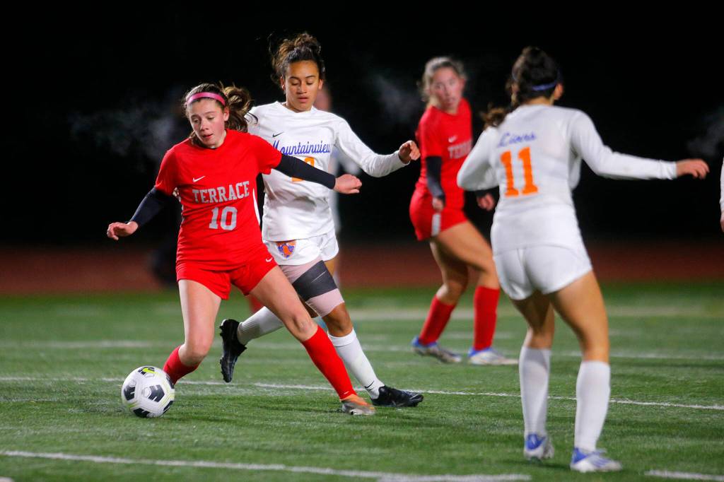 Mountlake Terraces Ally Villalobos Van Slooten turns away from a defender against Auburn Mountainview on Wednesday, Nov. 9, 2022, Edmonds District Stadium in Edmonds, Washington. Villalobos Van Slooten scored the only goal of the night for either side. (Ryan Berry / The Herald)