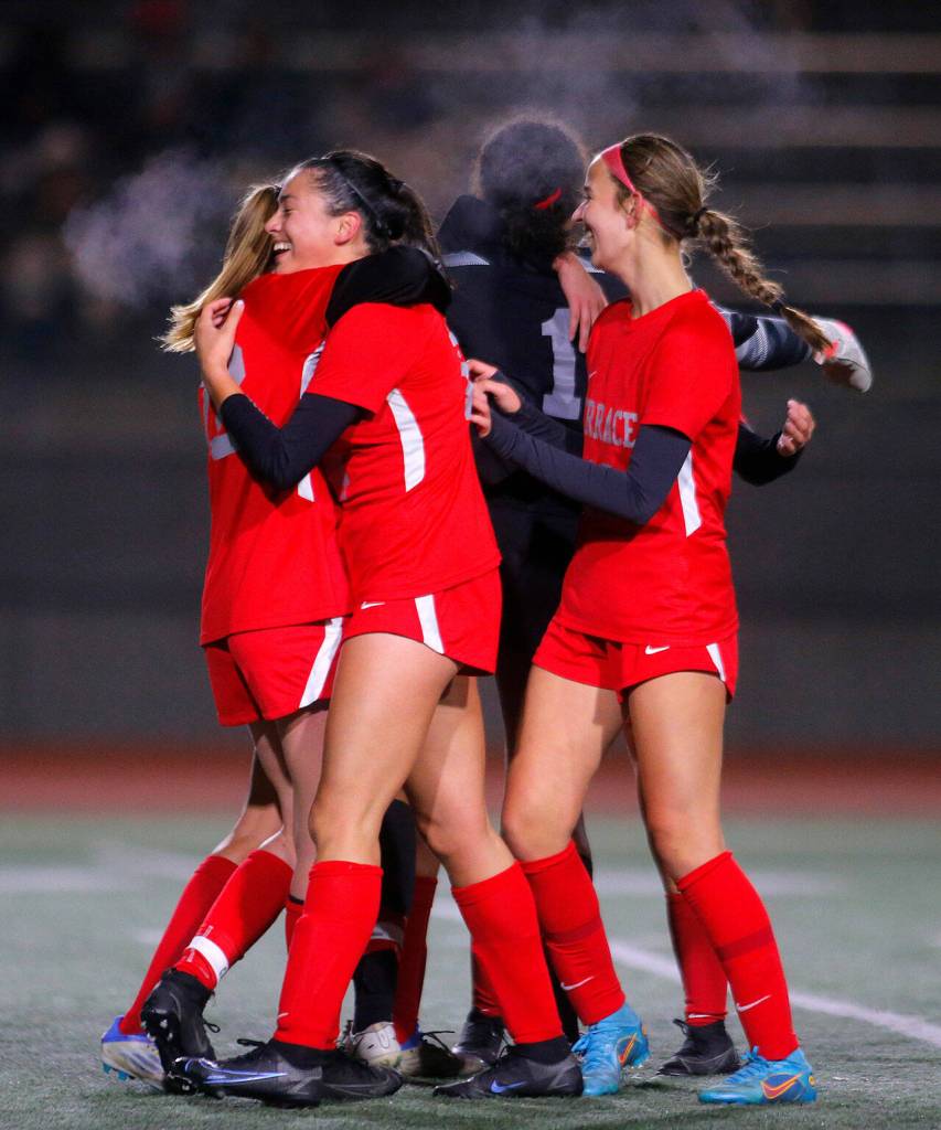 Mountlake Terrace begins celebrating their tournament win over Auburn Mountainview on Wednesday, Nov. 9, 2022, Edmonds District Stadium in Edmonds, Washington. (Ryan Berry / The Herald)