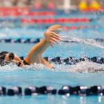 Jacksons Julia Song swims in the 400 yard freestyle relay final during the WIAA 4A Girls State Swim & Dive Championships on Saturday, Nov. 12, 2022, at the Weyerhaeuser King County Aquatic Center in Federal Way, Washington. (Ryan Berry / The Herald)
