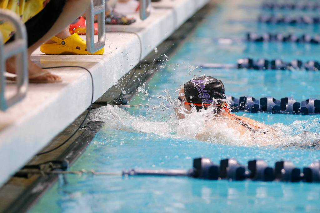 Kamiaks Aida Park finishes first in the consolation heat of the 500 yard freestyle during the WIAA 4A Girls State Swim & Dive Championships on Saturday, Nov. 12, 2022, at the Weyerhaeuser King County Aquatic Center in Federal Way, Washington. (Ryan Berry / The Herald)