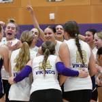Lake Stevens volleyball team members celebrate their win over Bothell during a Class 4A Wes-King Bi-District tournament match Nov. 8 in Lake Stevens. The Vikings are seeded fourth in the 4A state bracket. (John Gardner / Pro Action Image)