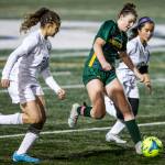 A Shorecrest player dribbles the ball down the field during game against Oak Harbor on Tuesday, Nov. 1, 2022 in Shoreline, Washington. (Olivia Vanni / The Herald)