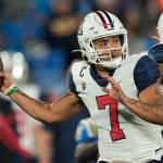 Arizona quarterback Jayden de Laura passes during the first half of an NCAA college football game against UCLA Saturday, Nov. 12, 2022, in Pasadena, Calif. (AP Photo/Mark J. Terrill)