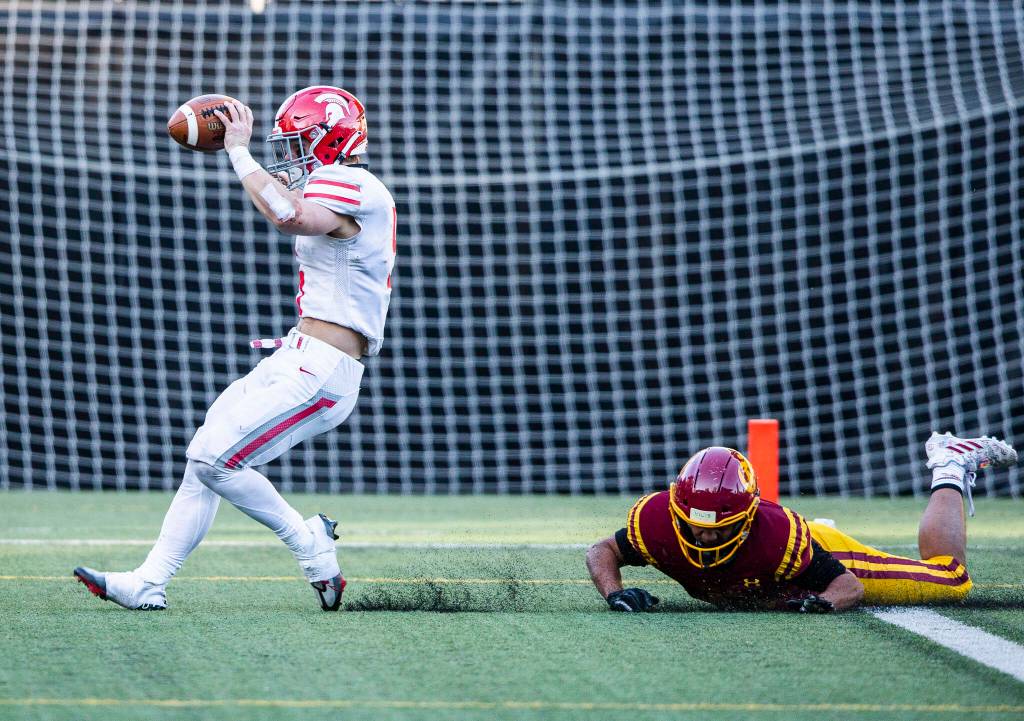 Stanwoods Ryder Bumgarner runs the ball in for a touchdown during the 3A quarterfinal game against Odea on Saturday, Nov. 19, 2022 in Seattle, Washington. (Olivia Vanni / The Herald)