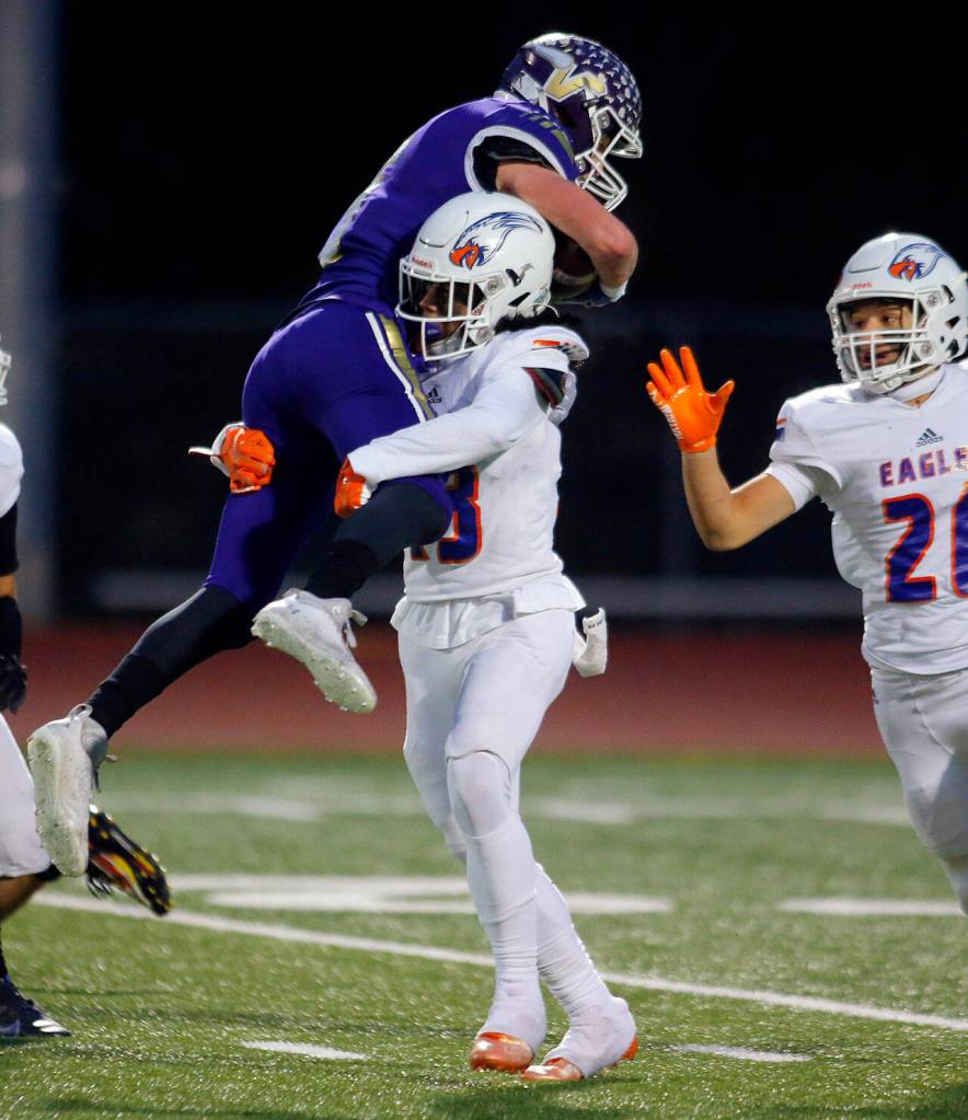 Lake Stevens Cole Becker body slammed after a long gain resulting in an unnecessary roughness penalty during the 4A semifinal against Graham-Kapowsin on Saturday, Nov. 26, 2022, at Lake Stevens High School in Lake Stevens, Washington. (Ryan Berry / The Herald)