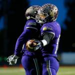 Limar celebrates after one of his five touchdown runs. (Ryan Berry / The Herald)