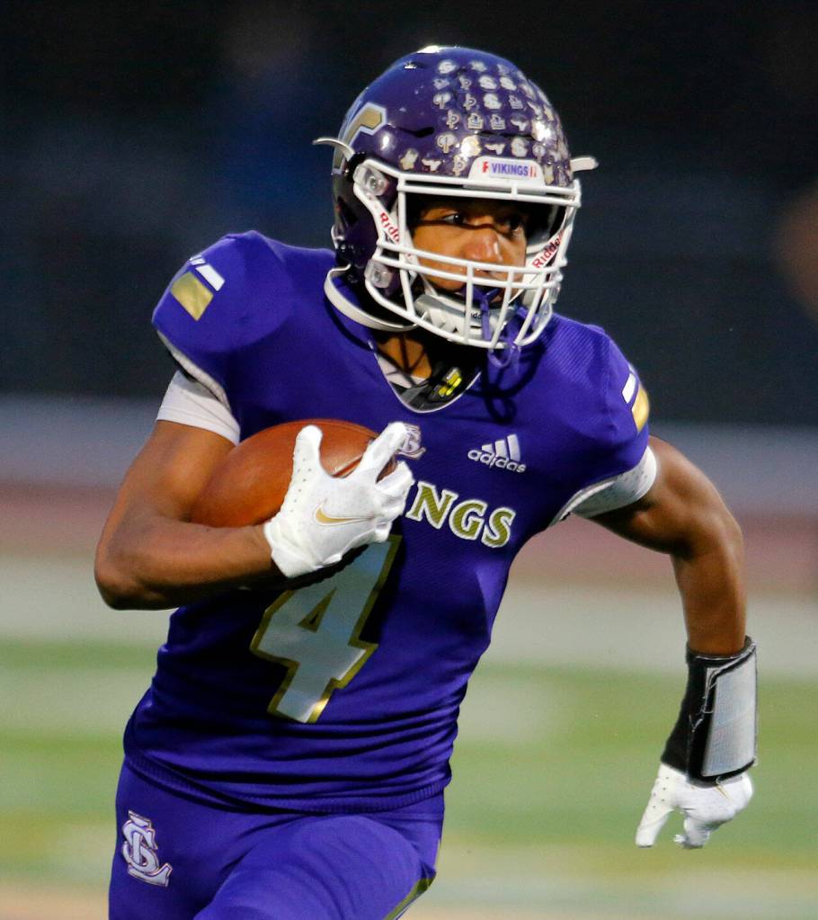 Lake Stevens Cassidy Bolong-Banks takes the ball up the field during the 4A semifinal against Graham-Kapowsin on Saturday, Nov. 26, 2022, at Lake Stevens High School in Lake Stevens, Washington. (Ryan Berry / The Herald)