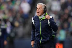 Seattle Seahawks head coach Pete Carroll yells from the sideline during the first half of an NFL football game against the Las Vegas Raiders Sunday, Nov. 27, 2022, in Seattle. (AP Photo/Gregory Bull)