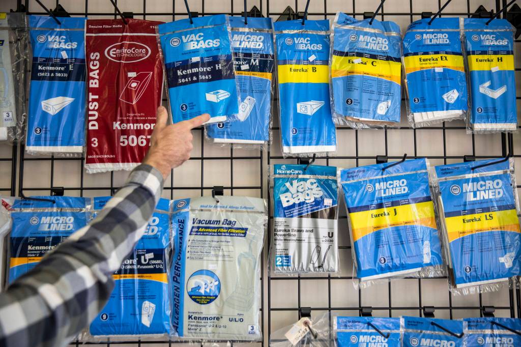 A wall of multiple vacuum bags available at Everett Vacuums new location. (Olivia Vanni / The Herald)