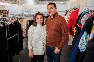 Cassandra Bell and husband Matthew Bell at their second hand story Cassandra’s Closet on Wednesday, Nov. 23, 2022 in Everett, Washington. (Olivia Vanni / The Herald)
