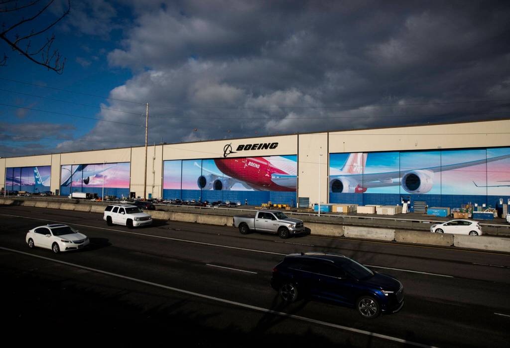 Traffic moves along Highway 526 in front of Boeings Everett Production Facility on Monday, Nov. 28, 2022 in Everett, Washington. (Olivia Vanni / The Herald)