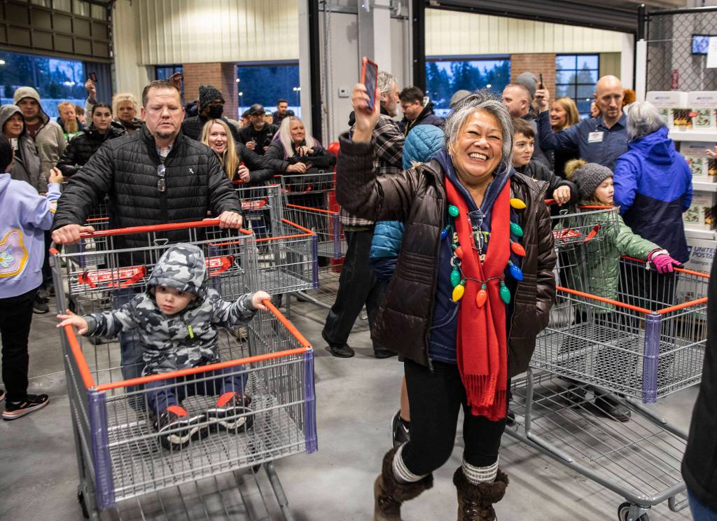Angie Edington was among the shoppers who visited the new Lake Stevens Costco on its first day. (Olivia Vanni / The Herald)