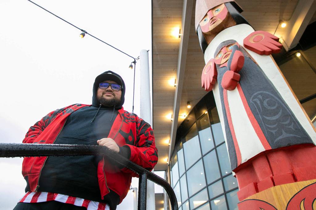 The figure was cut from a single, 500-year-old cedar log shipped south from Alaska. (Ryan Berry / The Herald)