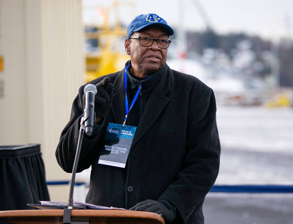Commissioner David Simpson greets the crowd during the dedication of the new Norton Terminal on Thursday, Dec. 1, 2022, at the Port of Everett in Everett, Washington. (Ryan Berry / The Herald)