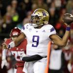 Washington quarterback Michael Penix Jr. (9) throws a pass during the first half of a game against Washington State last Saturday in Pullman. (AP Photo/Young Kwak)