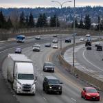 Traffic moves northbound on Interstate 5 through Everett on Friday. Some parts of I-5 North before 41st Street remain bumpy after work to replace concrete panels since October. (Olivia Vanni / The Herald)