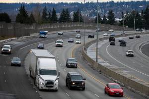 Traffic moves northbound on I-5 through Everett on Friday, Dec. 2, 2022. (Olivia Vanni / The Herald)