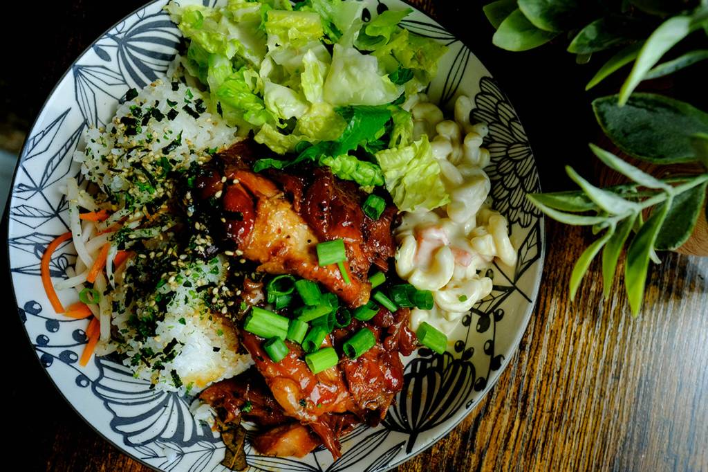 Enseamada, a new Filipino cafe in Everett, serves up generous plates like their adobo bowl, with soy garlic chicken, mac salad, rice and dressed lettuce. They also offer coffee drinks, halo halo and their must-have ensaymadas. (Taylor Goebel / The Herald)