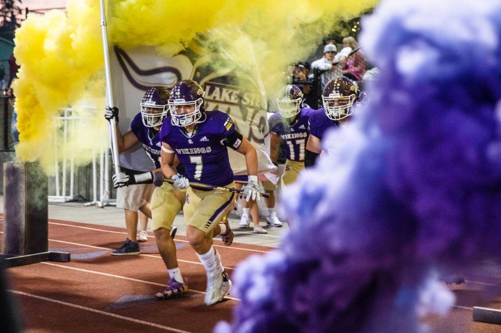 The Lake Stevens players run out onto the field before the start of the game against Eastlake on Friday, Oct. 7, 2022 in Lake Stevens, Washington. (Olivia Vanni / The Herald)