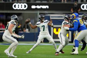 Seattle Seahawks quarterback Geno Smith throws during the first half against the Los Angeles Rams on Sunday in Inglewood, Calif. (AP Photo/Marcio Jose Sanchez)