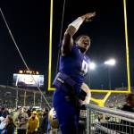 Washington quarterback Michael Penix Jr. (9) celebrates as he leaves Autzen Stadium after defeating Oregon in an NCAA college football game Saturday, Nov. 12, 2022, in Eugene, Ore. (AP Photo/Andy Nelson)