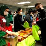 Providence-WSU residents assemble street medicine kits at Providence Regional Medical Center. (Joy Borkholder / The Herald)