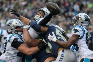 Carolina Panthers running back Chuba Hubbard (30) scores a touchdown against the Seattle Seahawks during the first half of Sundays game in Seattle. (AP Photo/Caean Couto)