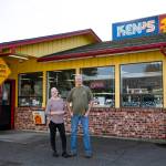 Ryan Berry / The Herald
Siblings Barbara Reed and Eric Minnig, who, co-own their parents old business Kens Camera along with their brother Bryan, stand outside the Evergreen Way location Thursday in Everett. After five decades in business, Kens will be closing at the end of the year.